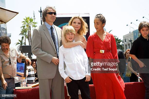 Actress Michelle Pfeiffer with her husband David E. Kelley and children John and Claudia at the star ceremony for Pfeiffer on the Hollywood Walk of...