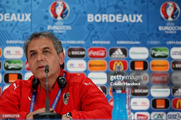 In this handout image provided by UEFA, Austria's head coach Marcel Koller talks during the Austria press conference at the Matmut Atlantique Stadium...