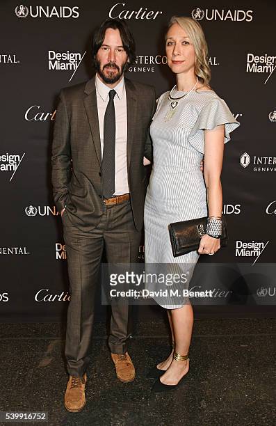 Keanu Reeves and artist Alexandra Grant attend the UNAIDS Gala during Art Basel 2016 at Design Miami/ Basel on June 13, 2016 in Basel, Switzerland.