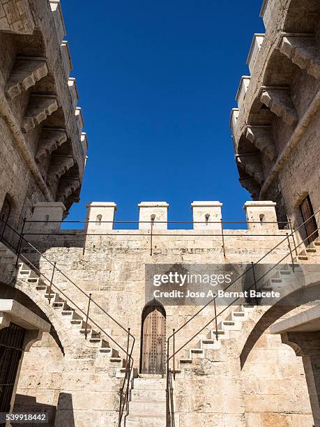 details inside quart's towers ( torres de quart), medieval strength in the city of valencina - fortress gate and staircases stockfoto's en -beelden