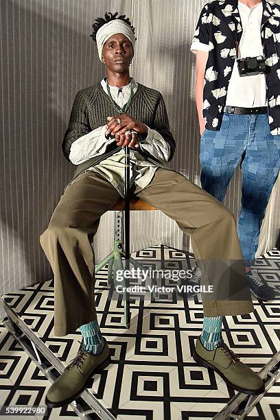 Model poses at the YMC during The London Collections Men SS17 on June 11, 2016 in London, England.