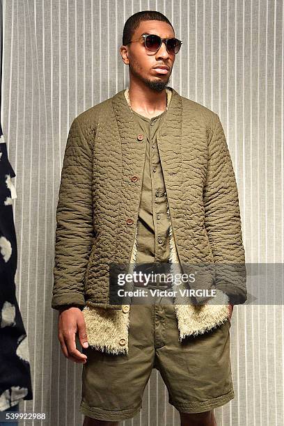 Model poses at the YMC during The London Collections Men SS17 on June 11, 2016 in London, England.