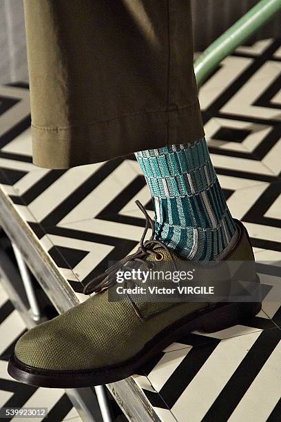 Model poses at the YMC during The London Collections Men SS17 on June 11, 2016 in London, England.