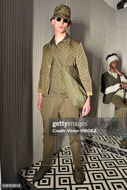 Model poses at the YMC during The London Collections Men SS17 on June 11, 2016 in London, England.