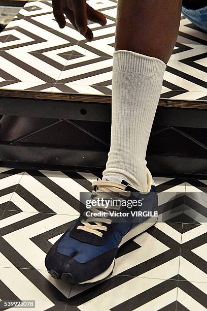 Model poses at the YMC during The London Collections Men SS17 on June 11, 2016 in London, England.