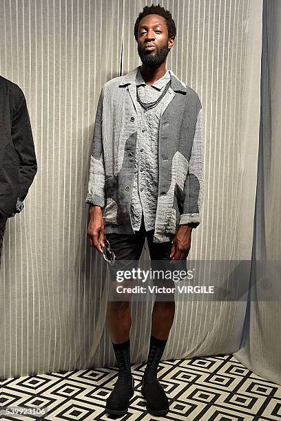 Model poses at the YMC during The London Collections Men SS17 on June 11, 2016 in London, England.