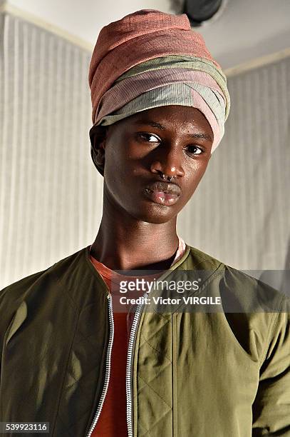Model poses at the YMC during The London Collections Men SS17 on June 11, 2016 in London, England.