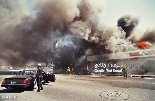 Trak Auto store is looted and burned on Washington Blvd. Near Norton. Los Angeles has undergone several days of rioting due to the acquittal of the...