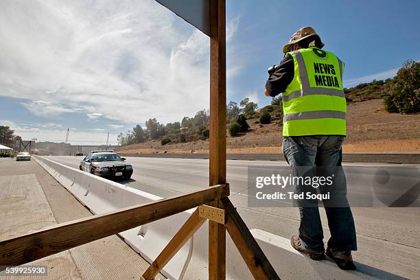 News photographer shoots the empty 405 freeway. Carmageddon 2 in Los Angeles. Construction crews demolish the Mulholland Bridge over the 405 freeway....