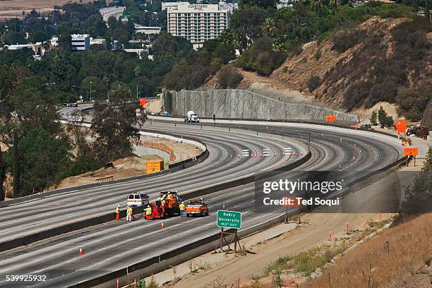 The 405 in full shut down mode. Carmageddon 2 in Los Angeles. Construction crews demolish the Mulholland Bridge over the 405 freeway. The 405 had to...