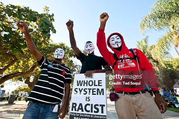 Protesters march through out South Los Angeles in response to the not guilty verdicts in the Trayvon Martin verdict in Florida.