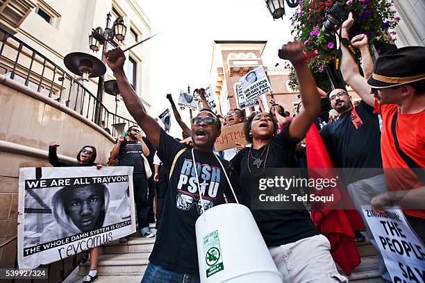 Protest marches through the posh city of Beverly Hills, in response to the Trayvon Martin murder verdict. Around 200 people marched up to Rodeo...