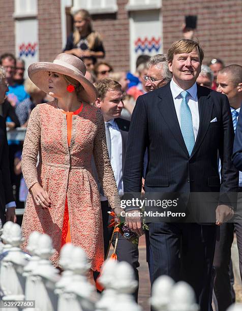 King Willem-Alexander and Queen Maxima of The Netherlands visit the harbour during their regional tour of north west Friesland province on June 13,...