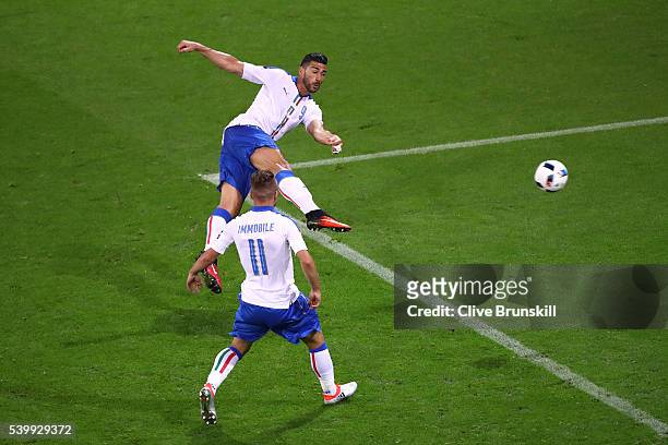 Graziano Pelle of Italy scores his team's second goal during the UEFA EURO 2016 Group E match between Belgium and Italy at Stade des Lumieres on June...