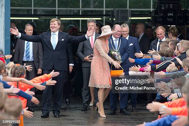 King Willem-Alexander and Queen Maxima of The Netherlands leave the sustainable tomato producer Empatec during their regional tour of north west...