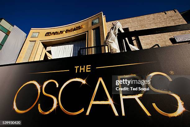 Preparations for the Academy Awards show begin on Hollywood Blvd. At Highland Ave.