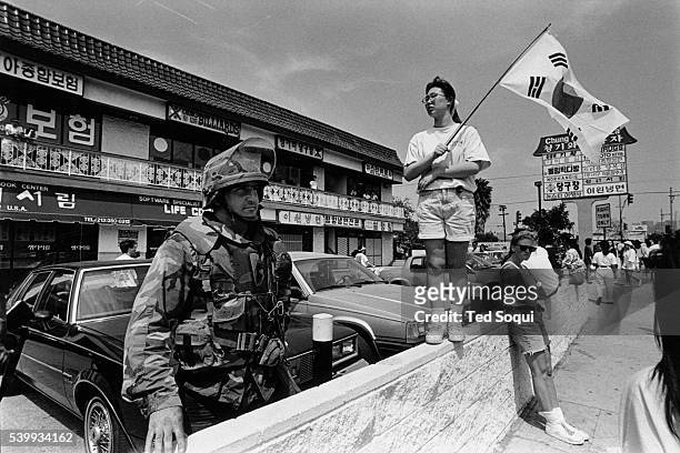 The National Guard at the Korean Pride Parade in Los Angeles following the 1992 riots that swept the city for days after three of four police...