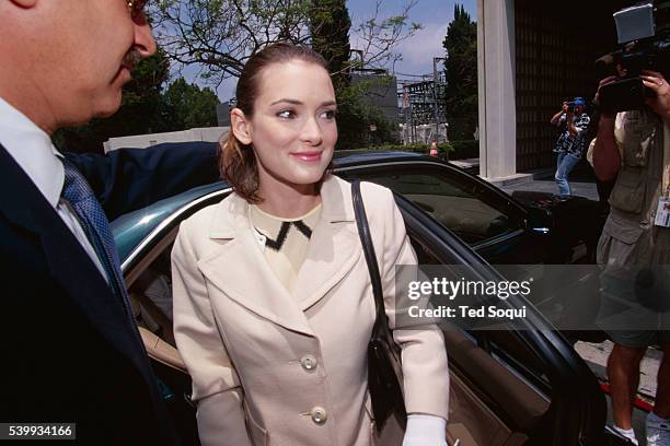 Actress Winona Ryder with her attorney Mark Geragos arriving at the Beverly Hills courthouse. Ryder's hearing on shoplifting and drug possession...