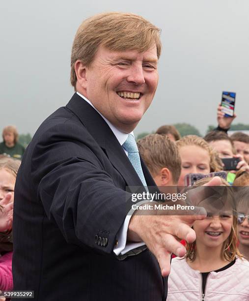 King Willem-Alexander of The Netherlands leaves the sustainable tomato producer Empatec during their regional tour of north west Friesland province...