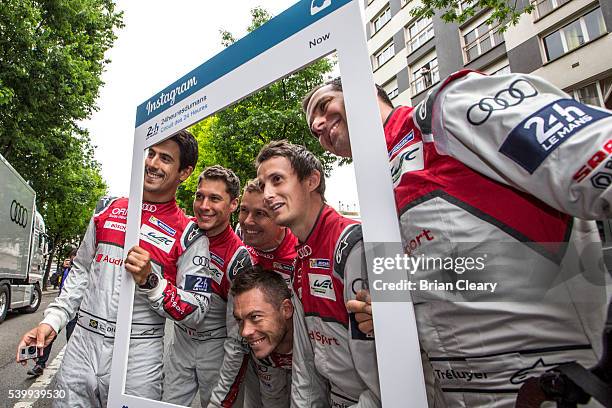 Audi team drvers, L to R, Lucas Di Grassi, of Brazil, Loic Duval, of France, Marcel Fassler, of Switzland, Andre Lotterer, of Belgium, Oliver Jarvis,...