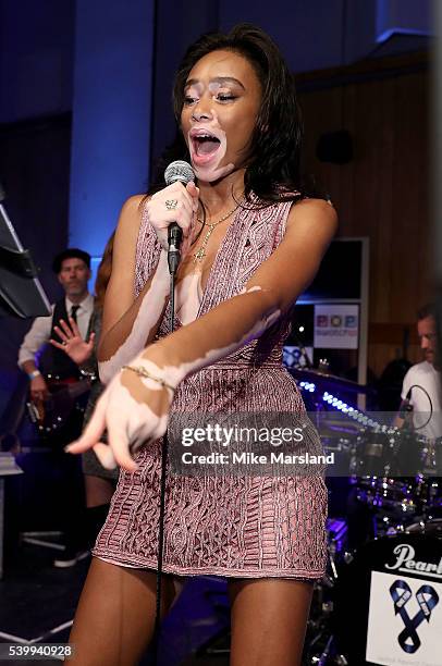 Winnie Harlow performs on stage as GQ and One For The Boys with Swatch host the London Collections Men closing night karaoke at Abbey Road Studios on...