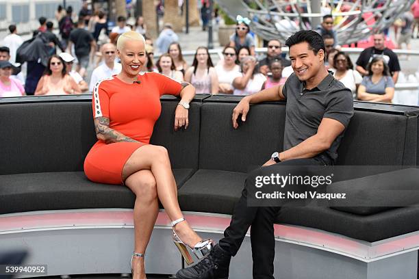 Amber Rose and Mario Lopez visit "Extra" at Universal Studios Hollywood on June 13, 2016 in Universal City, California.