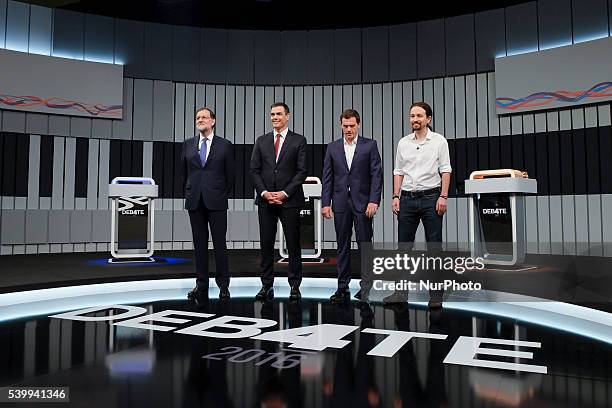 Spain's acting Prime Minister and Popular Party candidate Mariano Rajoy, left, leader of Socialist Party Pedro Sanchez, center left, Ciudadanos Party...