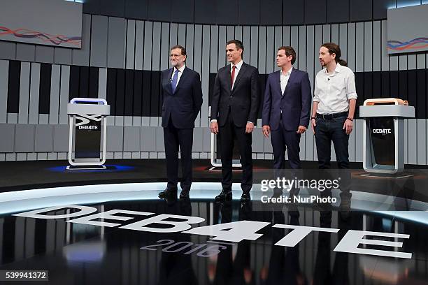 Spain's acting Prime Minister and Popular Party candidate Mariano Rajoy, left, leader of Socialist Party Pedro Sanchez, center left, Ciudadanos Party...