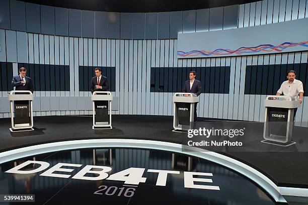 Spain's acting Prime Minister and Popular Party candidate Mariano Rajoy, left, leader of Socialist Party Pedro Sanchez, center left, Ciudadanos Party...