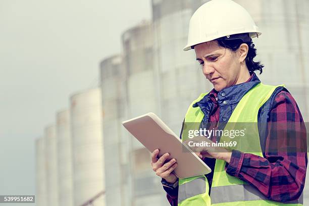 engineer at construction site - construction contract stock pictures, royalty-free photos & images