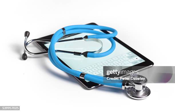 blue stethoscope with digital tablet - stethoscope white background stock pictures, royalty-free photos & images