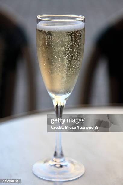 a glass of champagne - campagne france stock pictures, royalty-free photos & images