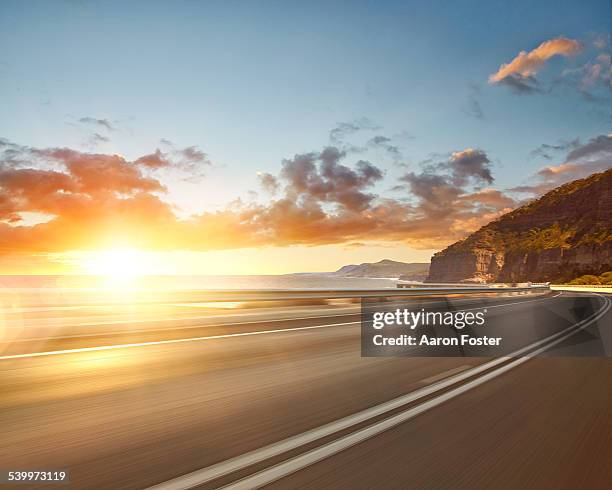 beach road - empty road stock-fotos und bilder