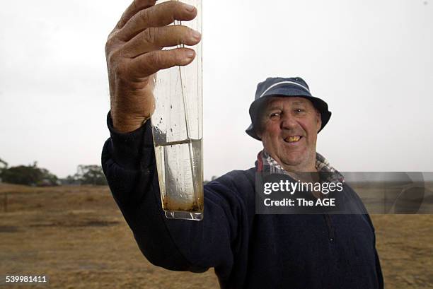 Bill Gordon at Wycheproof with 17 mm of welcome rain, 10 June 2005. THE AGE Picture by ANDREW DE LA RUE