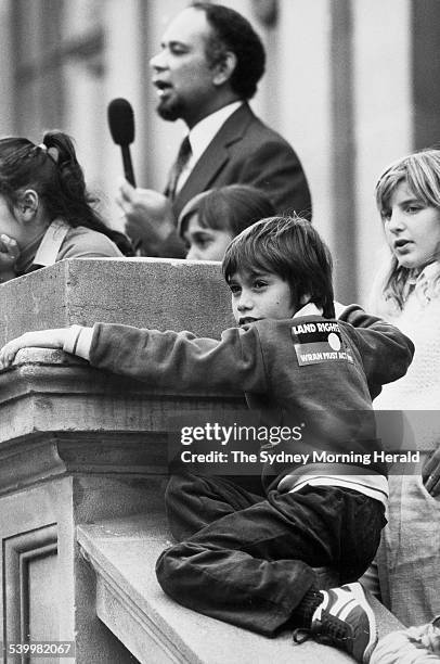 Malu Bellear of Bondi as he listens to his father, barrister Bob Bellear, address the Aboriginal Land Rights march in Sydney Square, 10 July 1981....