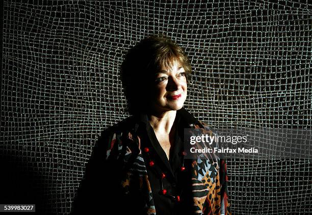 Jennifer Bott is the Chief Executive Officer of the Australia Council for the Arts. In the background is the painting by Dorothy Napangardi Robinson...