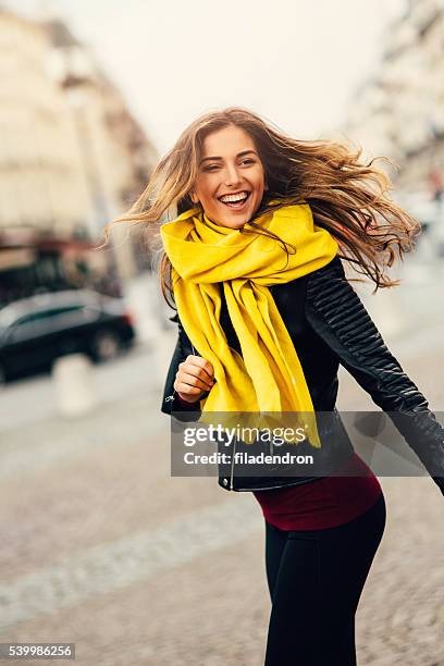 portrait of a happy woman - female waving on street stock pictures, royalty-free photos & images