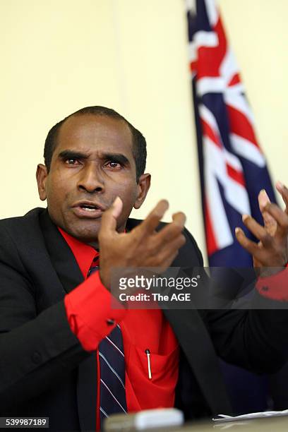 Photo shows some of the 42 West Papuan refugee's arriving in Melbourne after being granted temporary protection visa's. Seen here holding their flag...