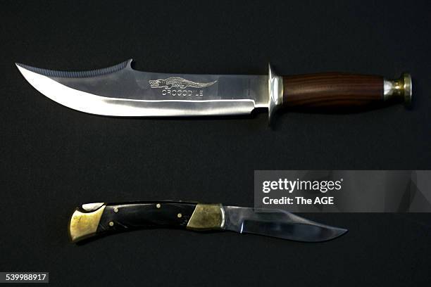 Crocodile Bowie Knife $39.95 top and Fancy Hunting Knife $7.95, on 6th March, 2006. THE AGE NEWS Picture by MICHAEL CLAYTON-JONES.