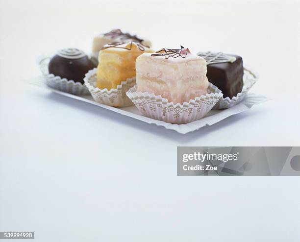 petit fours on paper plate - petit four bildbanksfoton och bilder