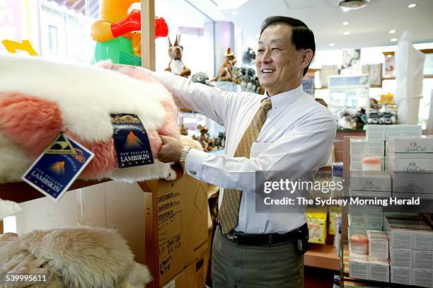 William Poh, owner of the shop Lanmark with some of his sheep skin rugs, 2 August 2006. SMH Picture by NATALIE BOOG