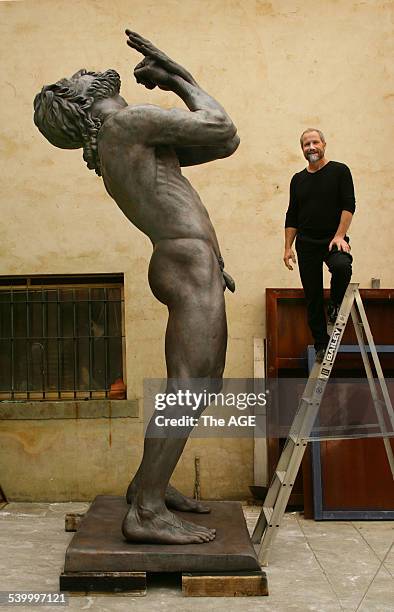 Peter Schipperheyn and his four-metre sculpture, Zarathustra, on 17th March, 2006. THE AGE ARTS Picture by SIMON SCHLUTER.