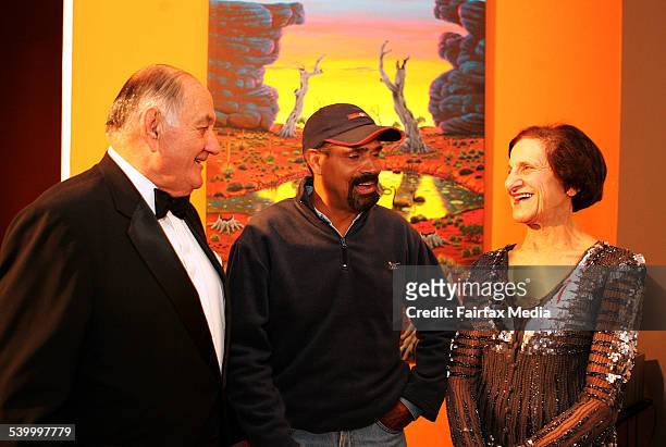 From left, Nicholas Shehadie with artist James Simons and Governor of New South Wales, Marie Bashir, at the opening of the James Simons' exhibition,...