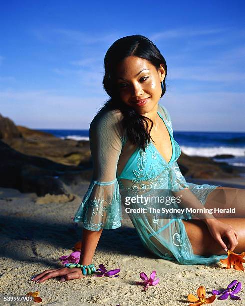 Performer Natalie Mendoza at the beach, 25 June 2001. SMH Picture by STEPHEN BACCON