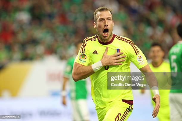 Jose Manuel Velazquez of Venezuela celebrates after scoring the opening goal during a group C match between Mexico and Venezuela at NRG Stadium as...