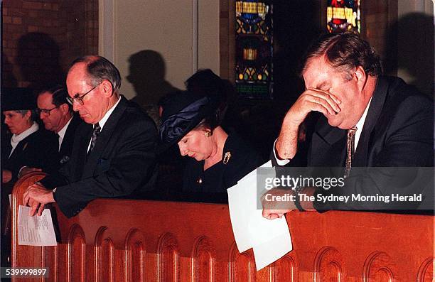 Prime Minister John Howard, his wife Janette Howard and the Leader of the Opposition Kim Beazley pray at an Ecumenical Service for the victims and...