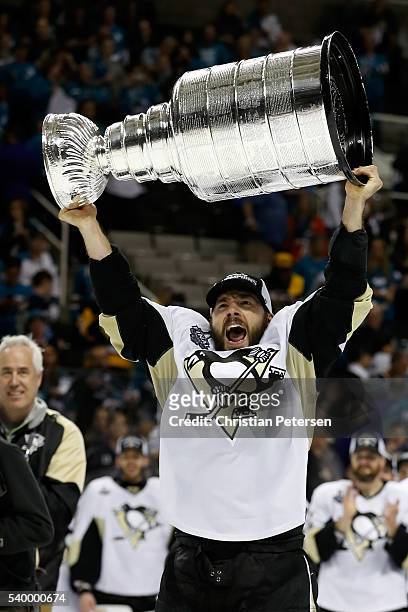Kris Letang of the Pittsburgh Penguins celebrates with the Stanley Cup after their 3-1 victory to win the Stanley Cup against the San Jose Sharks in...