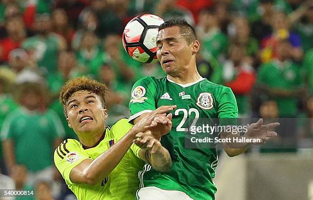 Adalberto Penaranda of Venezuela fights for the ball with Paul Aguilar of Mexico during the 2016 Copa America Centenario Group match between Mexico...