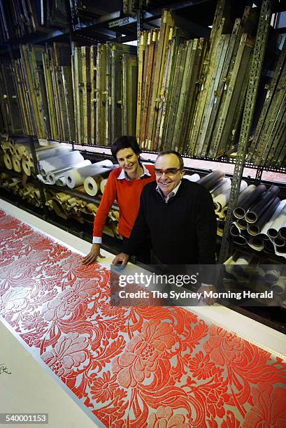 Helen and David Lennie of Signature Prints in Rosebery with a Florence Broadhurst wallpaper print called Tudor Floral Tapestry. They are photographed...