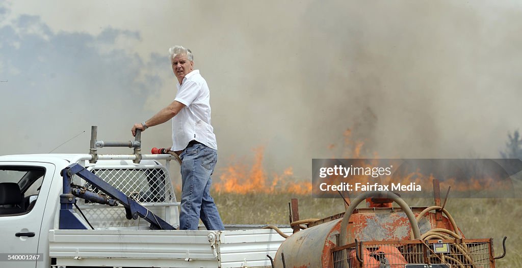 Neil Snape of Kamilaroi Road at Gunnedah protects his property from an approachi